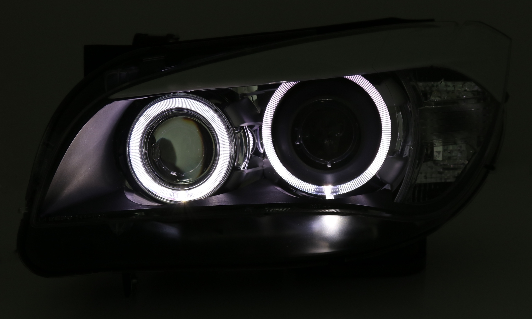 Angel Eyes Scheinwerfer für BMW X1 in Schwarz